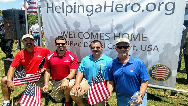 A group of men standing next to each other.